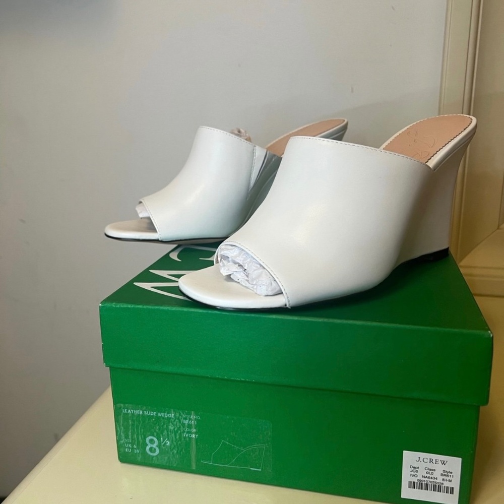 Leather white mules, never worn
